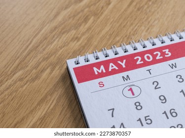 Closeup shot of a 2023 calendar, "April page". Selective focus shot of a calendar, focused on "May, 2023". - Shutterstock ID 2273870357