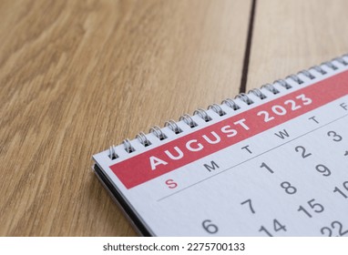 Closeup shot of a 2023 calendar, "August page". Selective focus shot of a calendar, focused on "August, 2023".