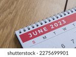 Closeup shot of a 2023 calendar, "June page". Selective focus shot of a calendar, focused on "June, 2023".