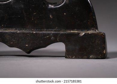 A Closeup Shot Of An Antique Black Chinese Calligraphy Pen Holder On A Gray Background