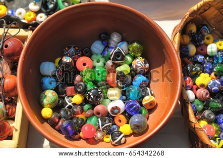Closeup shot of beads in a box.