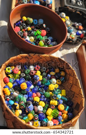 Closeup shot of beads in a box.