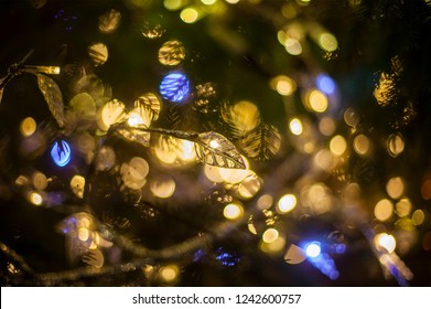Close-up shot of beautiful  illumination and decoration on the Christmas tree - Shutterstock ID 1242600757