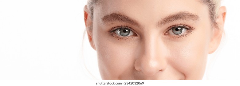 Close-up shot of beautiful woman's eyes on white background. - Powered by Shutterstock