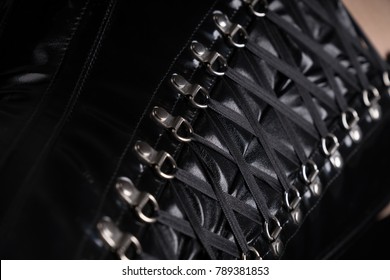 Close-up Shot Of Black Fetish Corset Lacing 