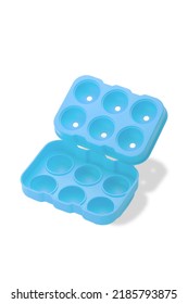 Close-up Shot Of A Blue Empty 6 Piece Silicone Ice Ball Mold With A Lid. The Open Spherical Ice Cube Mold Is Isolated On A White Background. Top View.