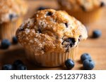 Close-up shot of blueberry muffin with selective focus on front of muffin