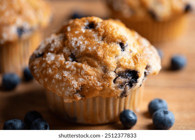 Close-up shot of blueberry muffin with selective focus on front of muffin