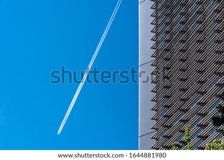 Image, Stock Photo Condensation trails and evening atmosphere in the sky