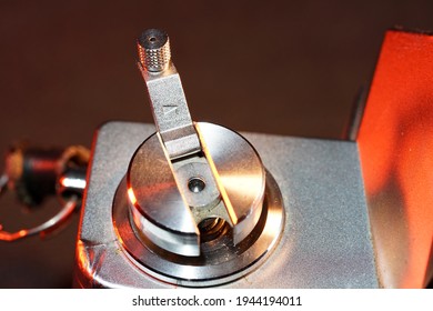 A Closeup Shot Of A Camera Rewind Crank-handle On The Film Rewind Knob