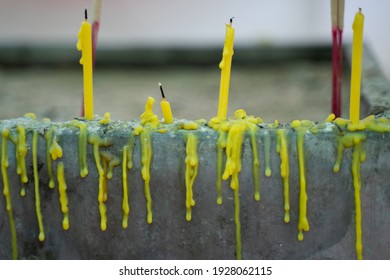 Close-up Shot Of Candle And Candle Teardrop That Pay Homage To Make Merit And Make Wish.