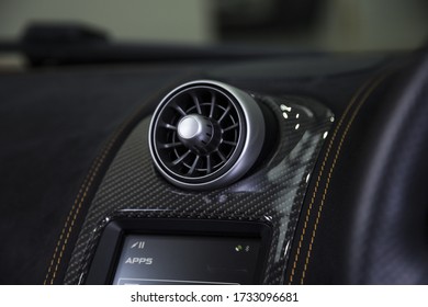 A Closeup Shot Of Car Aircon On A Black Dashboard In A Car