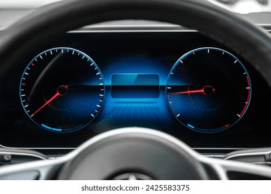 Close-up shot of a car's digital speedometer.Modern light car mileage (dashboard, milage). New display of a modern car.
