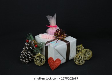 A closeup shot of Christmas gifts on an isolated background - Christmas concept - Shutterstock ID 1879102699