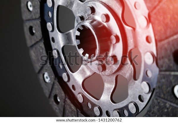 Close-up\
shot of clutch disk and basket on\
background