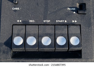 A Closeup Shot Of Control Buttons On An Old Cassette Tape Player