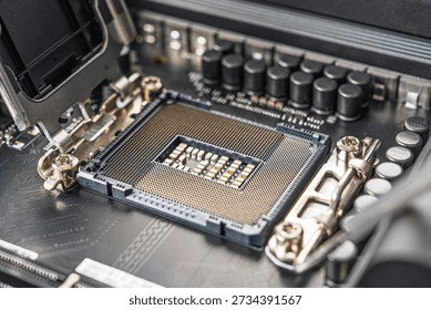 A close-up shot of a CPU socket on a modern motherboard, emphasizing its intricate design and importance in computing. Ideal for showcasing computer components and technology advancements.