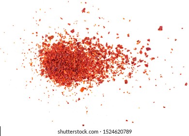 Close-up shot of crushed red chili pepper flakes isolated on white background, top view. - Powered by Shutterstock