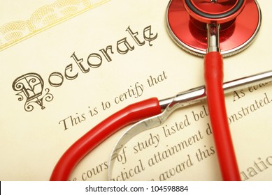 A Closeup Shot Of A Doctorate And Stethoscope For The Medical Graduate.