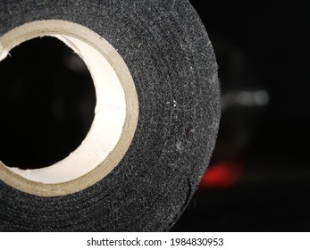 A Closeup Shot Of A Duck Tape Roll On A Black Background