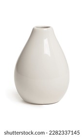 Close-up shot of an empty small ceramic vase covered with glaze. A white glossy vase with a narrow neck is isolated on a white background. Home decor element. Front view.