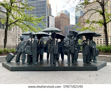 A closeup shot of the famous Gentlemen Statues in Chicago, Illinois in the United States of America