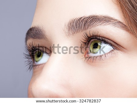 Similar – Eyelashes and eye with eyeliner