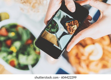 Closeup Shot Of Female Hands Holding Smartphone And Taking A Photo, Top View Of Hipster Girl Taking A Picture Of Food By Smartphone