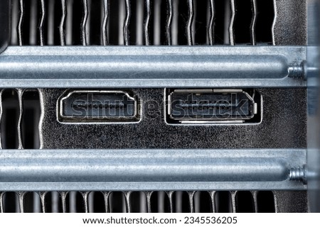 A closeup shot of firewire and small inputs on a digital computer workstation