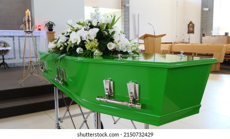 closeup shot of a funeral casket or coffin in a hearse or chapel or burial at cemetery
 - Shutterstock ID 2150732429