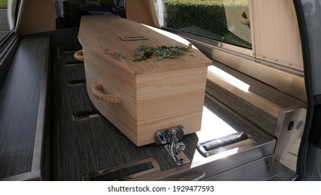 Closeup Shot Of A Funeral Casket In A Hearse Or Chapel Or Burial At Cemetery
