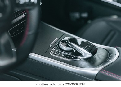 A Close-up shot of the gear shift, an automatic transmission gear of car