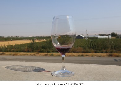 A Closeup Shot Of A Glass Of Wine On The Terrace On The Washington State