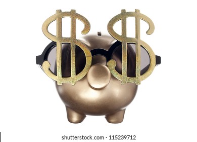 Close-up Shot Of Golden Piggy Bank Wearing Golden Dollar Sign Eye Glasses.