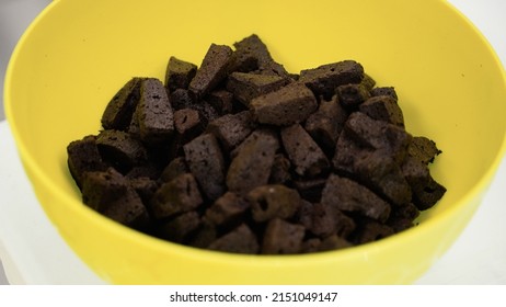 A Close-up Shot Of A Grow Pods Into A Bowl In Preparation For Planting Seeds Inside A Container Farm 