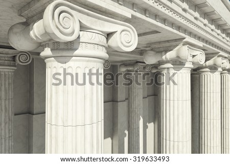 Close-up shot of a line of Greek-style columns.