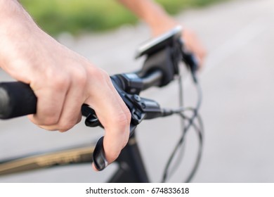 Closeup Shot Of A Male Hand On Bike Brake Lever