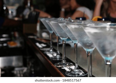 A Closeup Shot Of Martini Glasses At A Party