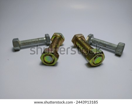 Close-up shot of metal hexagonal bolts and nuts