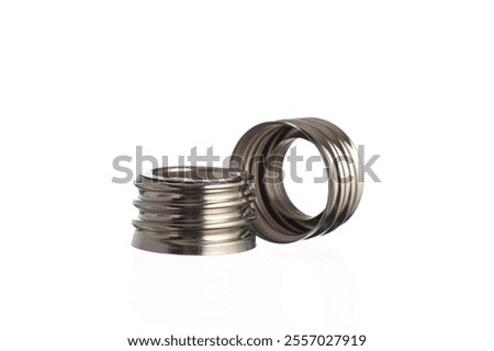 Close-up shot of a metallic E27 to E40 light bulb socket adapter on a white background.
A high-quality image lamp adapters.