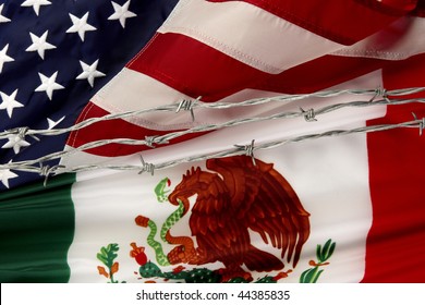 Close-up Shot Of Mexican And US Flags Separated By Barbed Wire