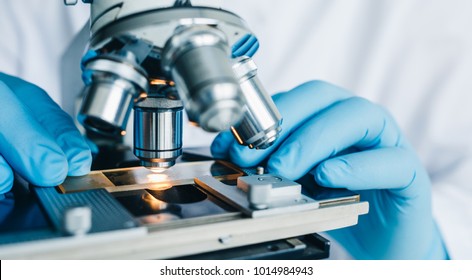 Close-up shot of microscope with metal lens at laboratory. - Powered by Shutterstock - Get 15% off with code: PIKWIZARD15