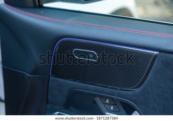 A closeup shot of a modern car interior control\
button details