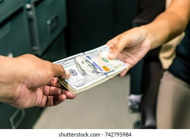 table under money cash passing closeup between shot shutterstock businessmen payoff corruption dollars illegal receiving quiet deal hands keep american