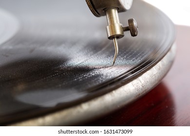 A Closeup Shot Of A Needle Of The Gramophone With A Shellac Disk