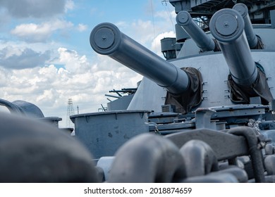 A Closeup Shot Of A New Metal Battleship Guns