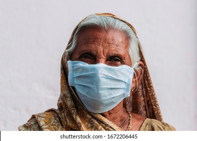 Closeup Shot Of An Old Lady Wearing Mask