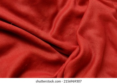 A Closeup Shot Of A Red Cotton Fabric