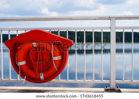 Similar – Image, Stock Photo red railing and white chimney of old boat against blue sky