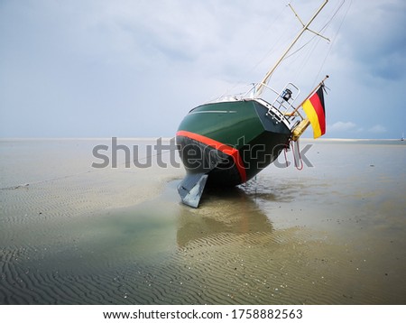 Similar – Reflection of a sailboat